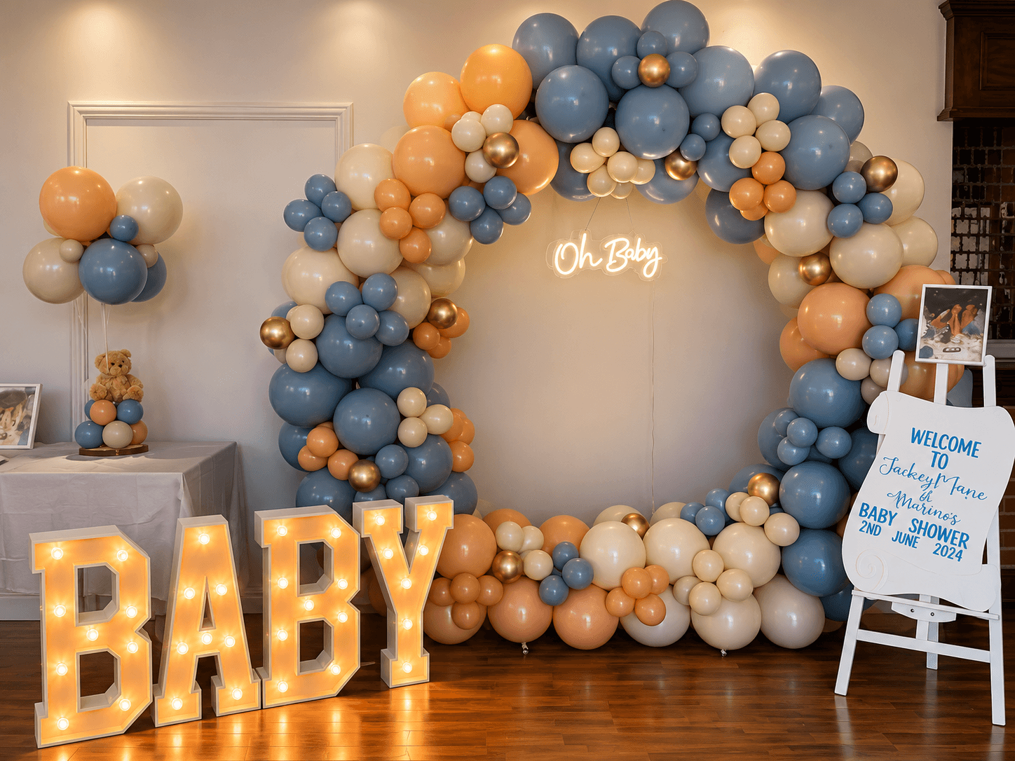 Illuminated LED BABY sign with pastel balloon display for baby shower hire from Cameron's Events