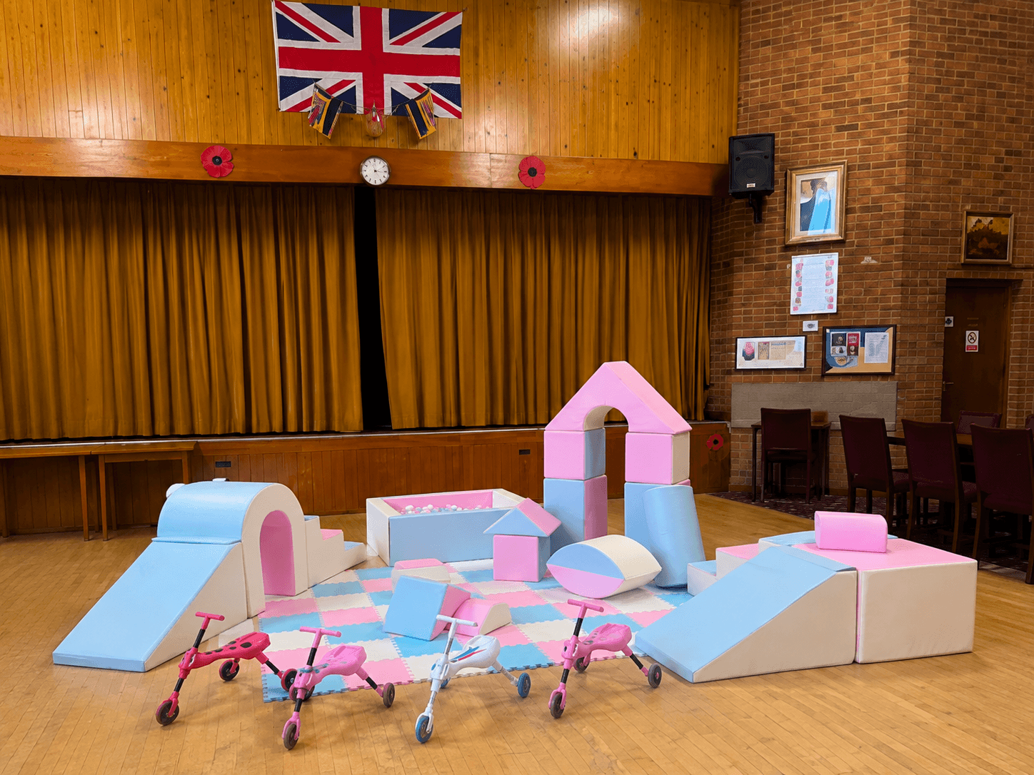 Pastel soft play and ride-ons setup from Cameron's Events