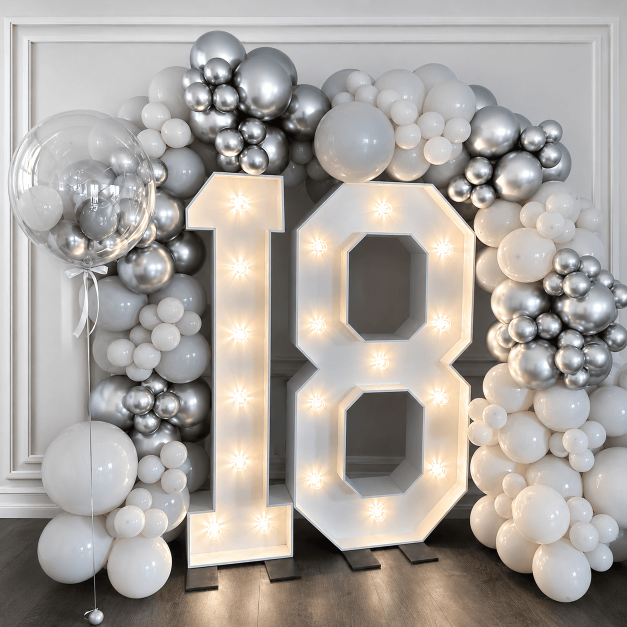 5ft illuminated number 18 with premium silver and white balloon display from Cameron's Events